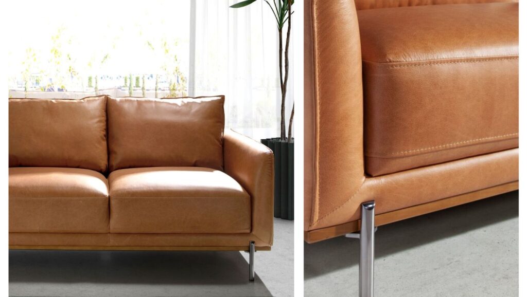 Sofá de piel marrón con detalles de costuras